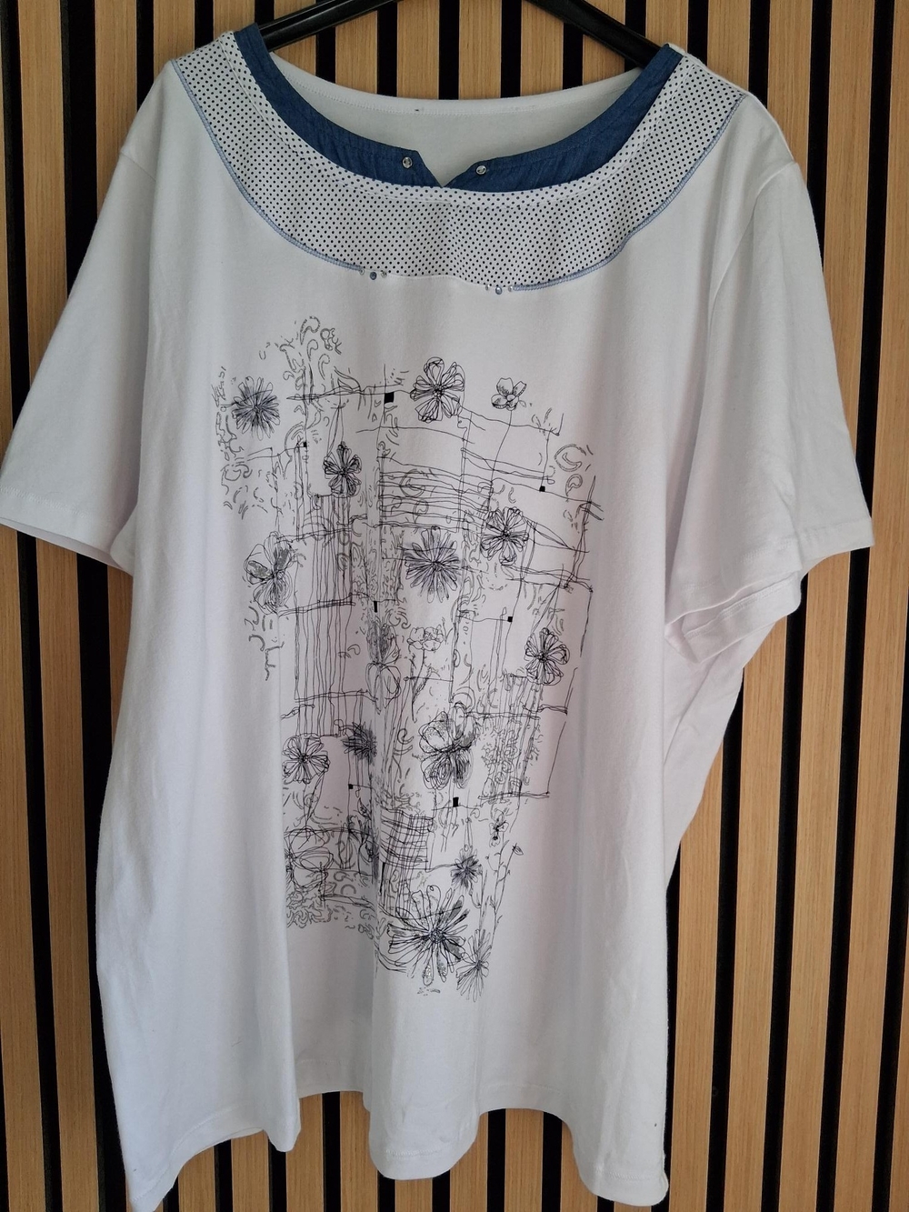 Women's White Short Sleeve Top with Blue Trim and Floral Sketch